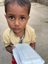 Kalirbazar Jewellery Owners' Association of Narayanganj distributes food among street children celebrating the birthday of Bangladesh Jeweller's Samity (BAJUS) President Sayem Sobhan Anvir.